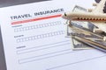 Travel  insurance form with model and policy document Royalty Free Stock Photo