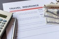 Travel  insurance form with model and policy document Royalty Free Stock Photo