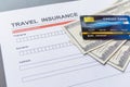 Travel  insurance form with model and policy document Royalty Free Stock Photo
