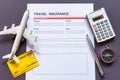 Travel  insurance form with model and policy document Royalty Free Stock Photo