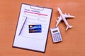 Travel  insurance form with model and policy document Royalty Free Stock Photo