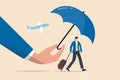 Travel insurance, protection for traveller before flying in COVID-19 Coronavirus era concept, magic hand holding umbrella as Royalty Free Stock Photo