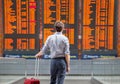 Travel with international flight, person passenger waiting in airport Royalty Free Stock Photo