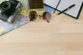 Travel item photo camera, Passports, on a wooden floor. Royalty Free Stock Photo