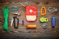 Travel items for hiking over wooden background