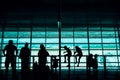 Travel with Kids Concept. Silhouette of a Big Family Passengers Waiting for Boarding in Terminal Airport Royalty Free Stock Photo