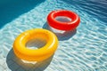 Round inflatables rubber swimming rings in pool. Generative AI Royalty Free Stock Photo