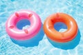 Round inflatables rubber swimming rings in pool. Generative AI Royalty Free Stock Photo