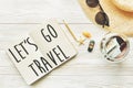 Travel. let`s go travel text sign concept on empty notebook. pla Royalty Free Stock Photo