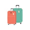 Travel luggage with bag tags attached to handle. Two wheeled baggage, tourists cases for vacation, flight, trip, tourism