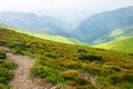 Travel, trekking, nature. Majestic, high green mountains. Horizontal frame Royalty Free Stock Photo