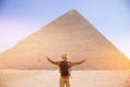 Travel man in hat stand background Egyptian pyramid sunset Giza Cairo, Egypt Royalty Free Stock Photo