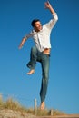 Travel man jumping happy to vacation Royalty Free Stock Photo