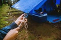 Travel nature relax in the holiday. camping on the moutain in the wild nature. Pull the rope Carabiner