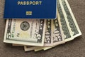 Travel passport and money, American dollars banknotes bills on copy space background, top view. Traveling and  finance problems Royalty Free Stock Photo