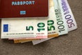 Travel passport and money, Euro banknotes bills on copy space background, top view. Traveling and finance problems concept Royalty Free Stock Photo