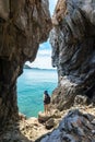 Travel people women tourist in a cave near the sea in Keo Sichang, holiday tourist, Thailand Royalty Free Stock Photo