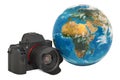 Travel and photo shooting concept. Digital camera with Earth Globe. 3D rendering