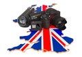 Travel and photo, video shooting in Great Britain. Digital camera, camcorder and action camera on the United Kingdom map. 3D Royalty Free Stock Photo