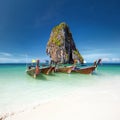 Travel photography of wooden boats on shore of tropical sea