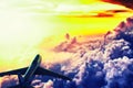The plane flies in the sky above the clouds Royalty Free Stock Photo