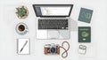 Travel Planning Workspace with Laptop and Accessories Royalty Free Stock Photo