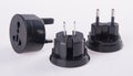 Travel plug adapter on a background Royalty Free Stock Photo