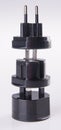 Travel plug adapter on a background Royalty Free Stock Photo