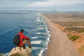 Travel in Point Reyes National Seashore, hiker man with backpack enjoying scenic view, California, USA Royalty Free Stock Photo