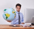 Travel, portrait or businessman with globe, earth or worldwide destination for trip in office. Agent, computer or