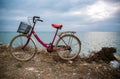 travel and relaxation: old bicycle at the seaside Royalty Free Stock Photo