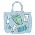 Travel sanitizer kit. Disinfectant, medical mask, gloves, alcohol spray and wipes in bag. New normal life during covid