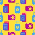 Travel seamless pattern. Baggage, ticket, photo camera in retro color palette. Travel background on yellow backdrop Royalty Free Stock Photo