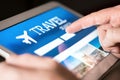 Travel search engine and website for holidays. Man using tablet to look for cheap flights and hotels.