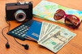 Travel set passport money blank notebook camera road map sunglasses calculator, headphones. Summer accessorie Royalty Free Stock Photo