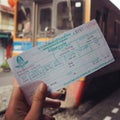 Seating ticket, traveling by Thai train.