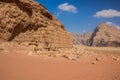 Travel sightseeing photography desert landscape stone brick ruins of some building object under sand stone rock, Wadi Rum Royalty Free Stock Photo