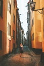 Travel in Stockholm woman walking alone Royalty Free Stock Photo