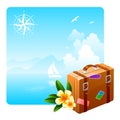 Travel suitcase and tropical flowers