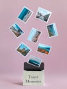 Travel template, levitating travel photos flew out of a small suitcase with memories