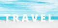 Travel text on white wooden surface front of blue sea and sky