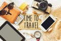 travel. time to travel concept text sign on card. summer planning vacation, flat lay. tablet, camera sunglasses compass passport Royalty Free Stock Photo