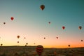 Travel to Cappadocia background photo. Hot air balloons on the sky in morning Royalty Free Stock Photo