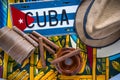 Travel to Cuba concept, hat, cigars and flag Royalty Free Stock Photo