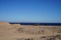 Sand dunes on the coast of the Gulf of Aqaba. Dahab, South Sinai Governorate, Egypt Royalty Free Stock Photo
