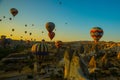 Travel to Goreme, Cappadocia, Turkey. The sunrise in the mountains with a lot of air hot balloons in the sky