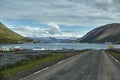 A mountain road to the town of Isafjordur and a view of the fjord