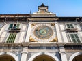 facade of medieval Clock Tower in Brescia city