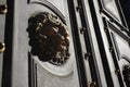 The head of a lion. The decoration of the old door. Royalty Free Stock Photo