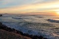 Travel to magnificent colorful scenery of atlantic ocean with breaking waves with mountain la rhune in sunset, capbreton, france Royalty Free Stock Photo